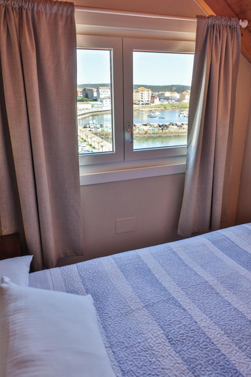 Apartamentos Arnela กามาริญาส ภายนอก รูปภาพ